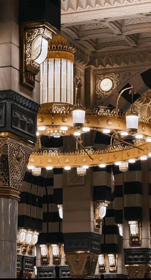 Ornate Islamic architecture and lighting inside the mosque